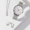 stainless_steel_watch_earrings_pendant_pearl_mop_stones_mesh_mia.jpg Stainless steel MOP watch
